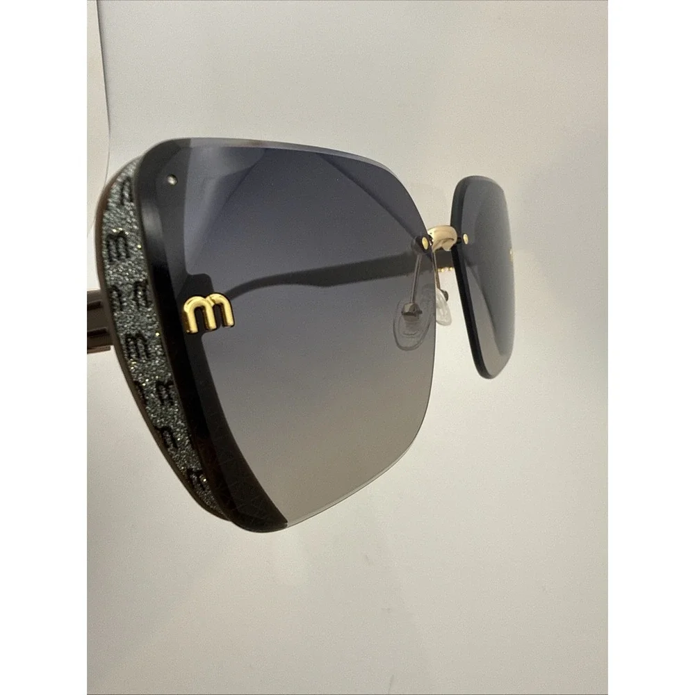 Miu Miu Aube Authentic Womens Sunglasses Black frameless Gold trim Gradient Lens